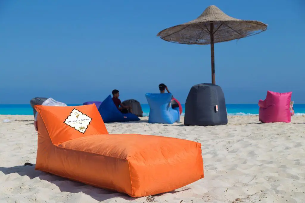 بين باج Outdoor برتقالي على شاطئ Oriental Rivoli الساحل الشمالي من Bomba Now